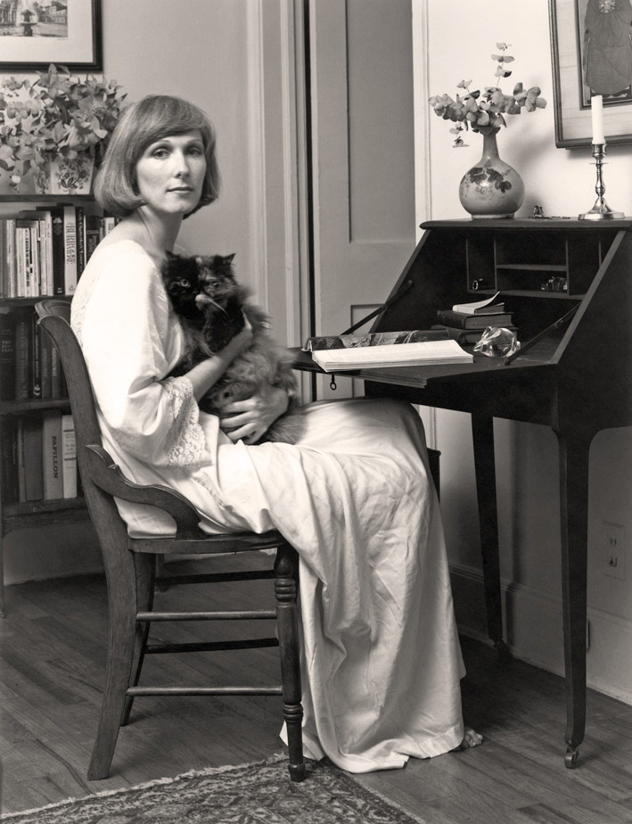 portrait of woman with cat